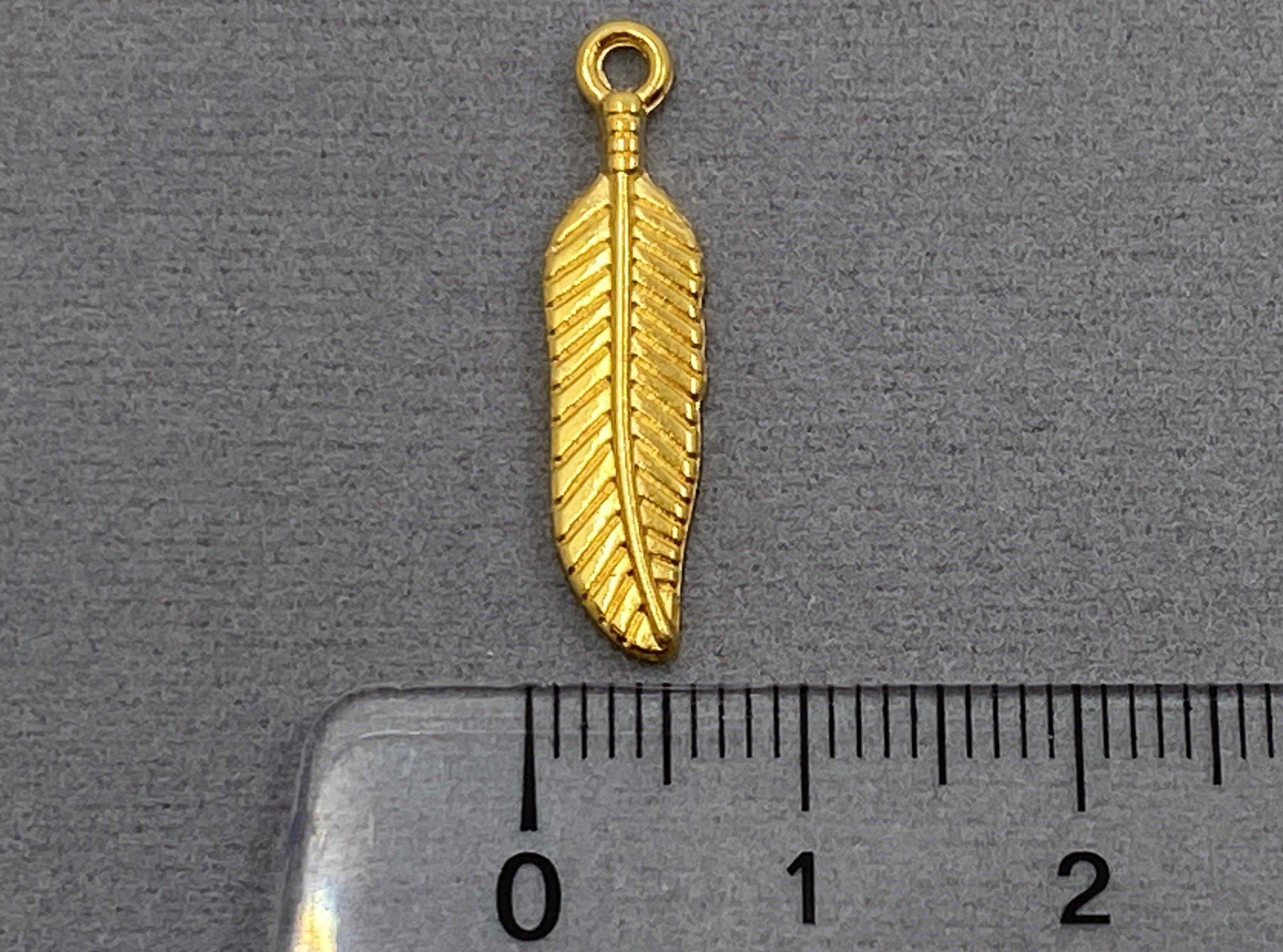 Anhänger Metall Feder 24 mm, Farbe gold - bead&more