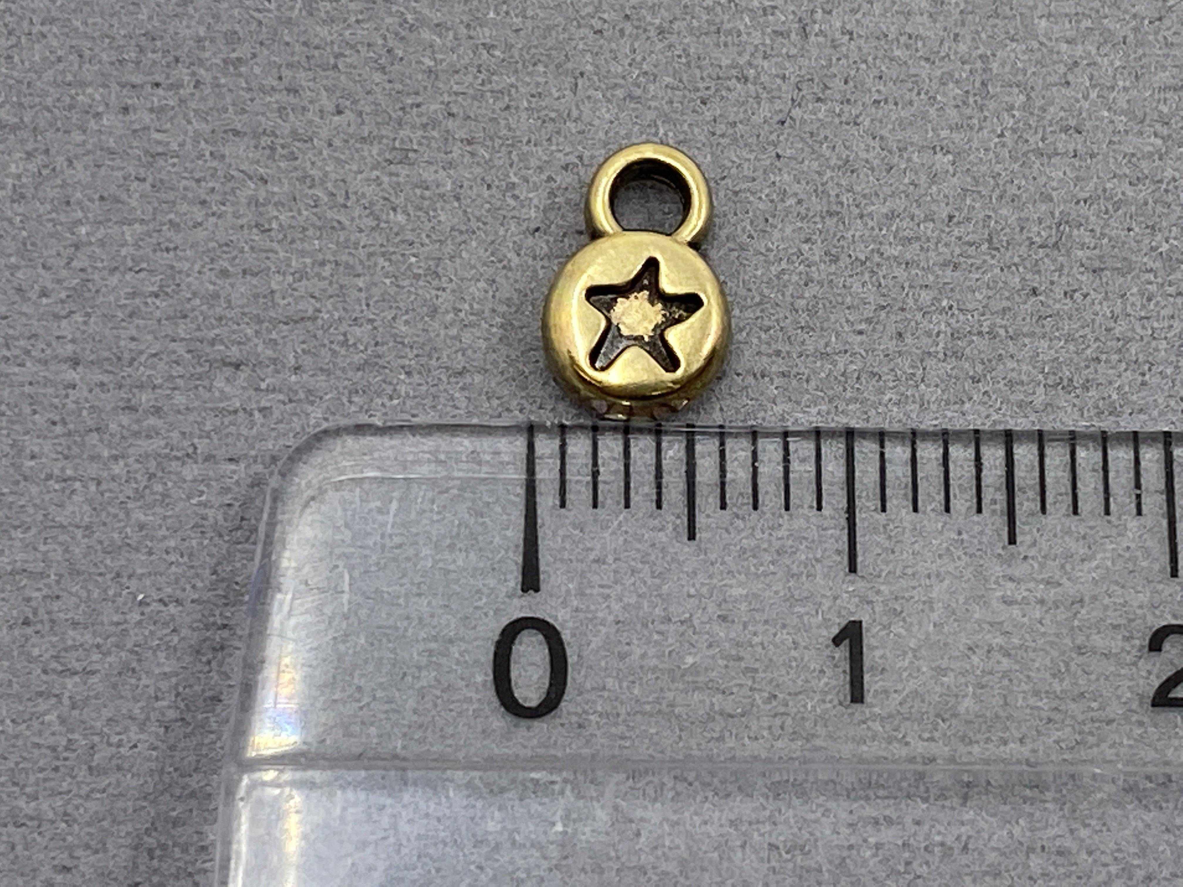 Anhänger Metall rund mit Stern 9 mm, Farbe altmessing - bead&more