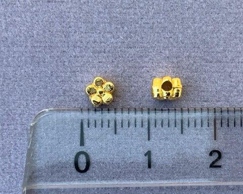 Metallperle "Blümchen", gold - bead&more
