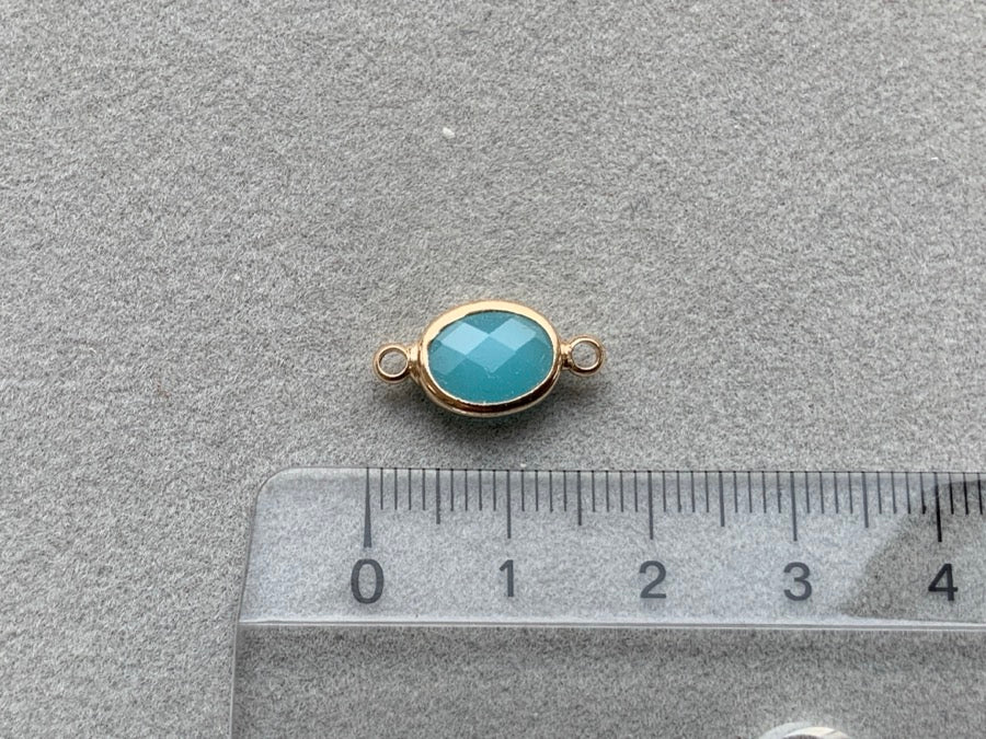 Partie intermédiaire en métal "Crystal Glass Oval", coloris bleu turquoise opale - doré