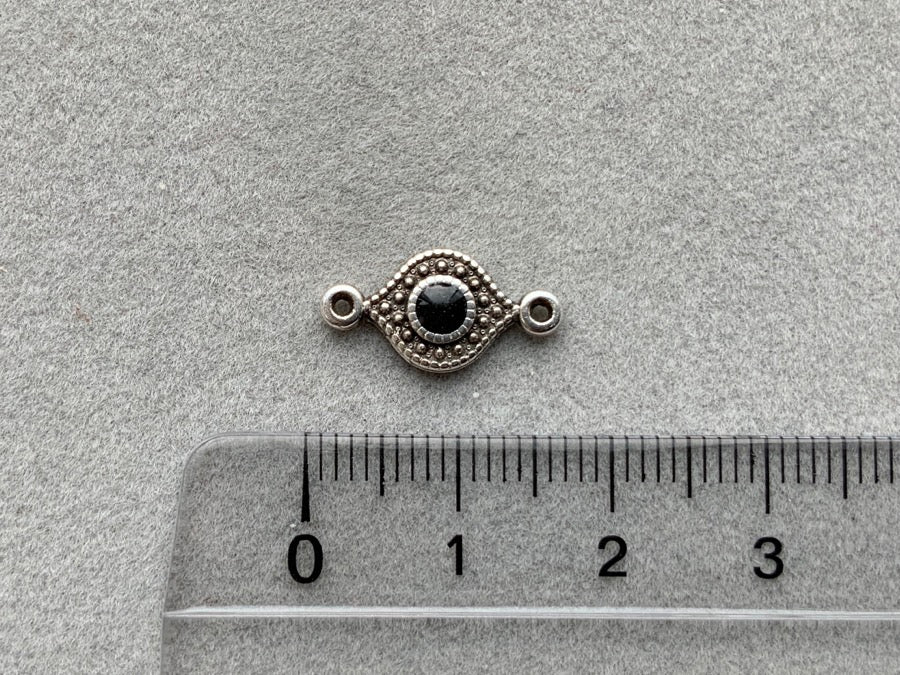 Partie intermédiaire en métal "Eye", couleur noir - argent antique