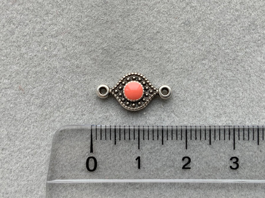 Parte intermedia "Occhio" in metallo, colore rosso corallo - argento antico