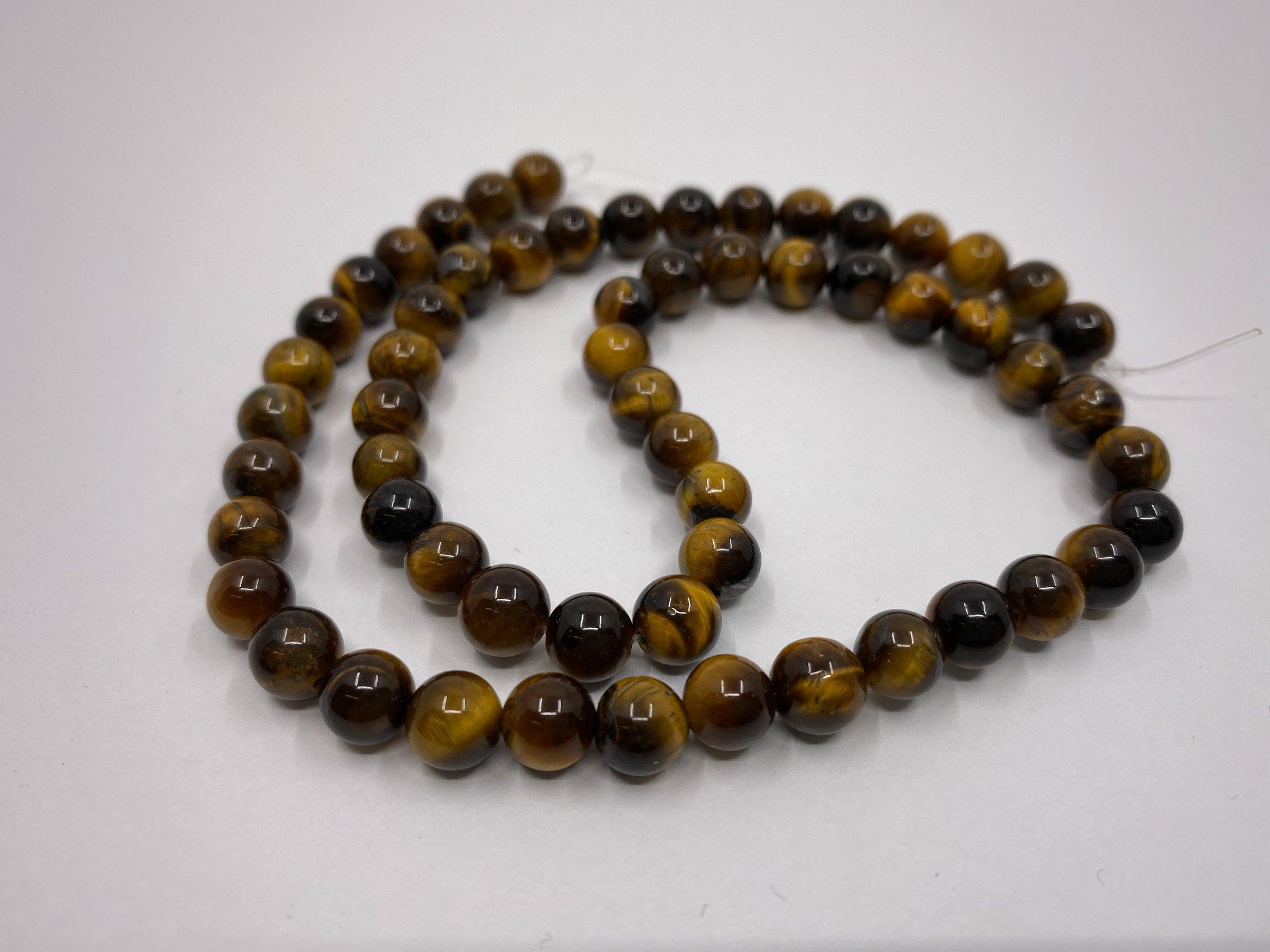 Naturstein Perlen Tigerauge 6 mm - Farbe braun - bead&more