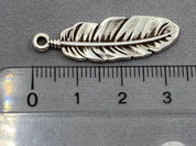 Pendentif en métal "plume", couleur argent