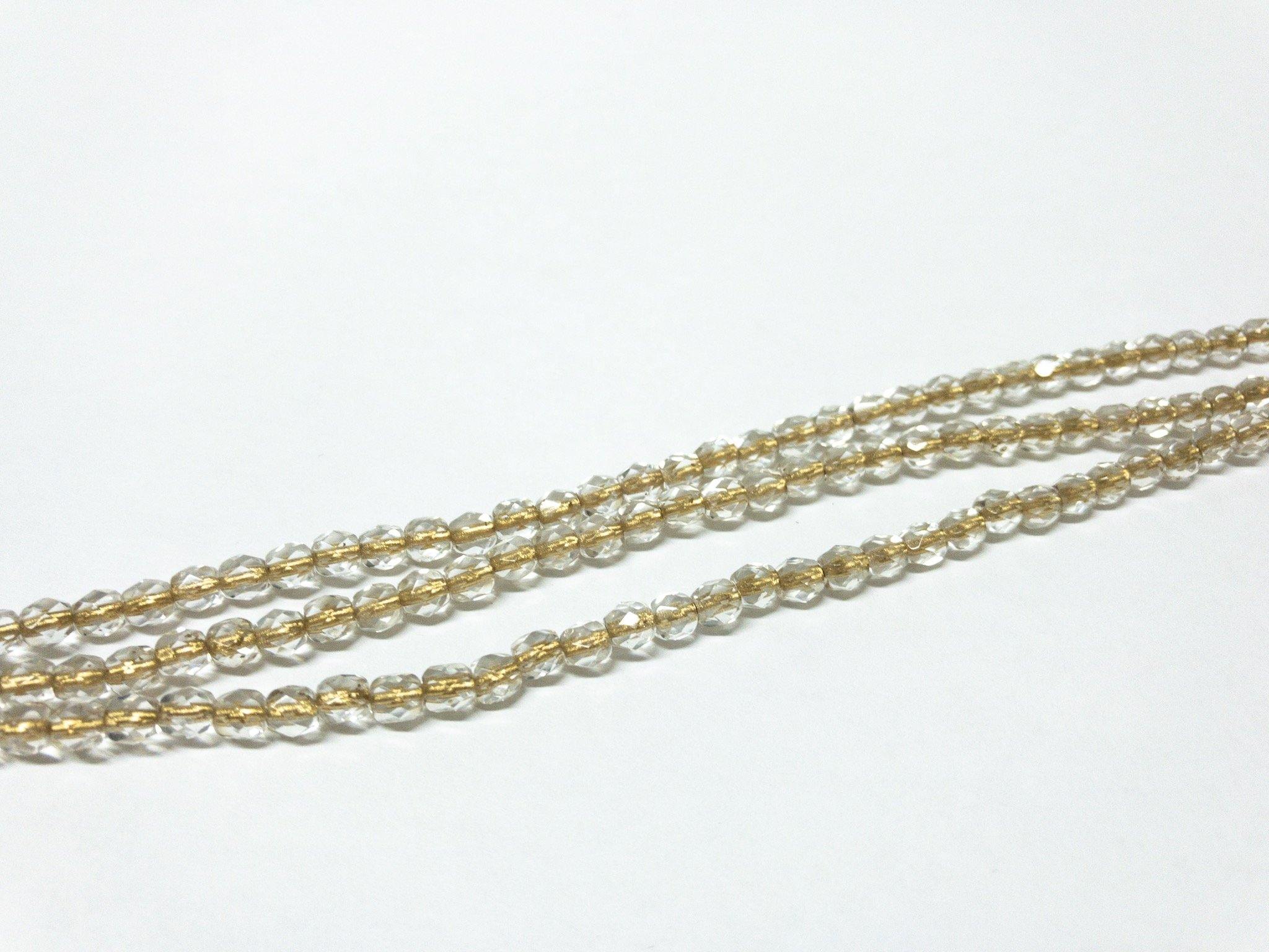 Glasschliffperlen feuerpoliert 4mm, Farbe B73 Crystal gold line - bead&more