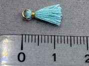 Anhänger Mini-Quaste 1 cm, Farbe gold, türkis - bead&more