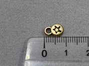 Anhänger Metall rund mit Stern 9 mm, Farbe altmessing - bead&more