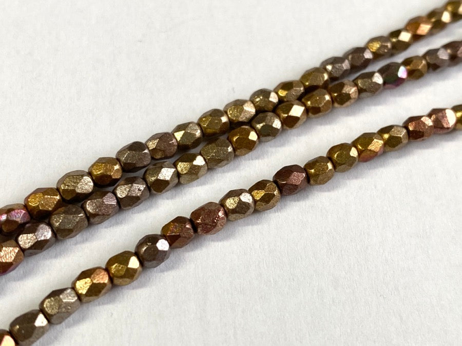 Perle di vetro lucidato a fuoco 4mm, colore B891 Metallic Bronze Multicolor