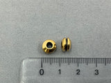 Perlina in metallo "Disc Grooved", dorata