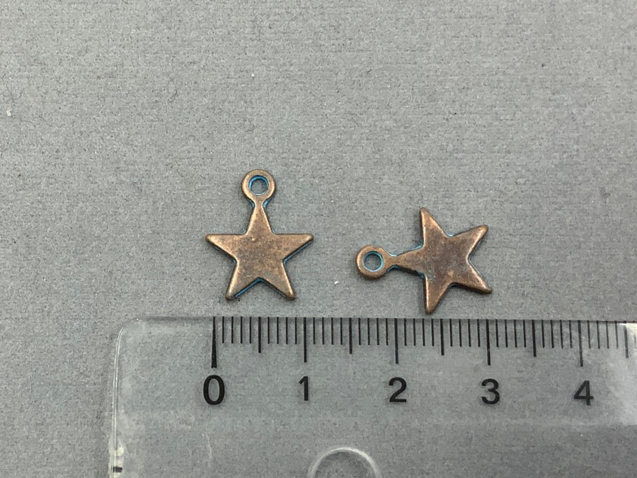 Pendentif en métal «étoile», couleur bleu cuivre