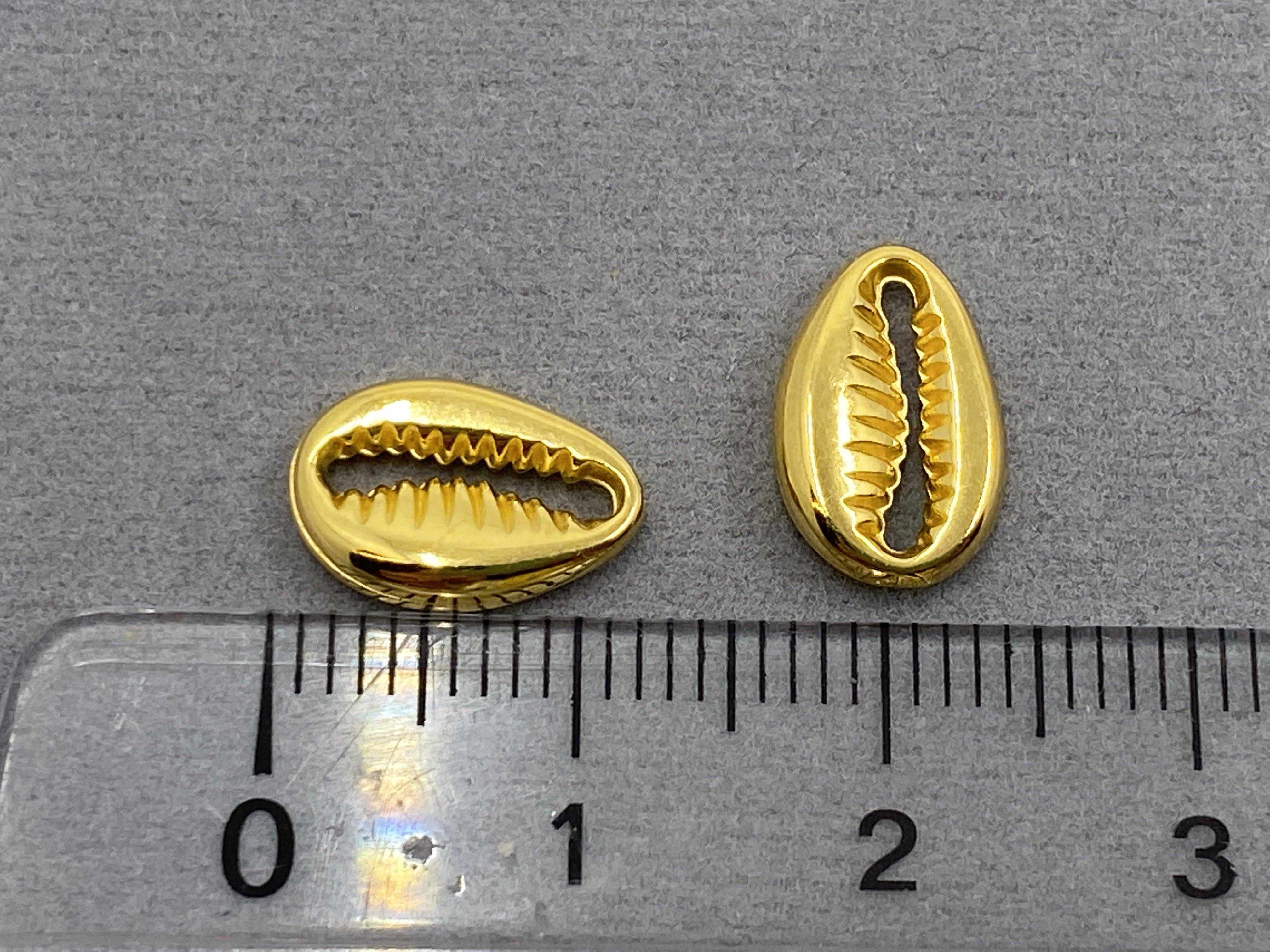 Zwischenteil Metall "Kauri Muschel", Farbe gold - bead&more